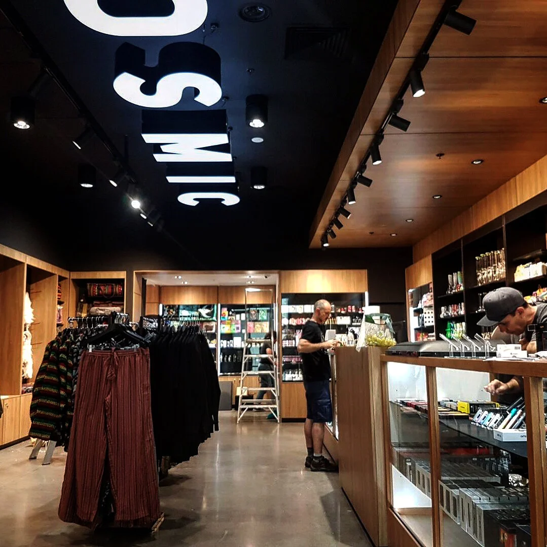 Cosmic retail storefront with bold lettering above the entrance