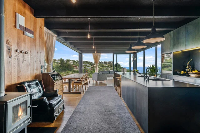 Timber-lined interior with open outlook and long counter