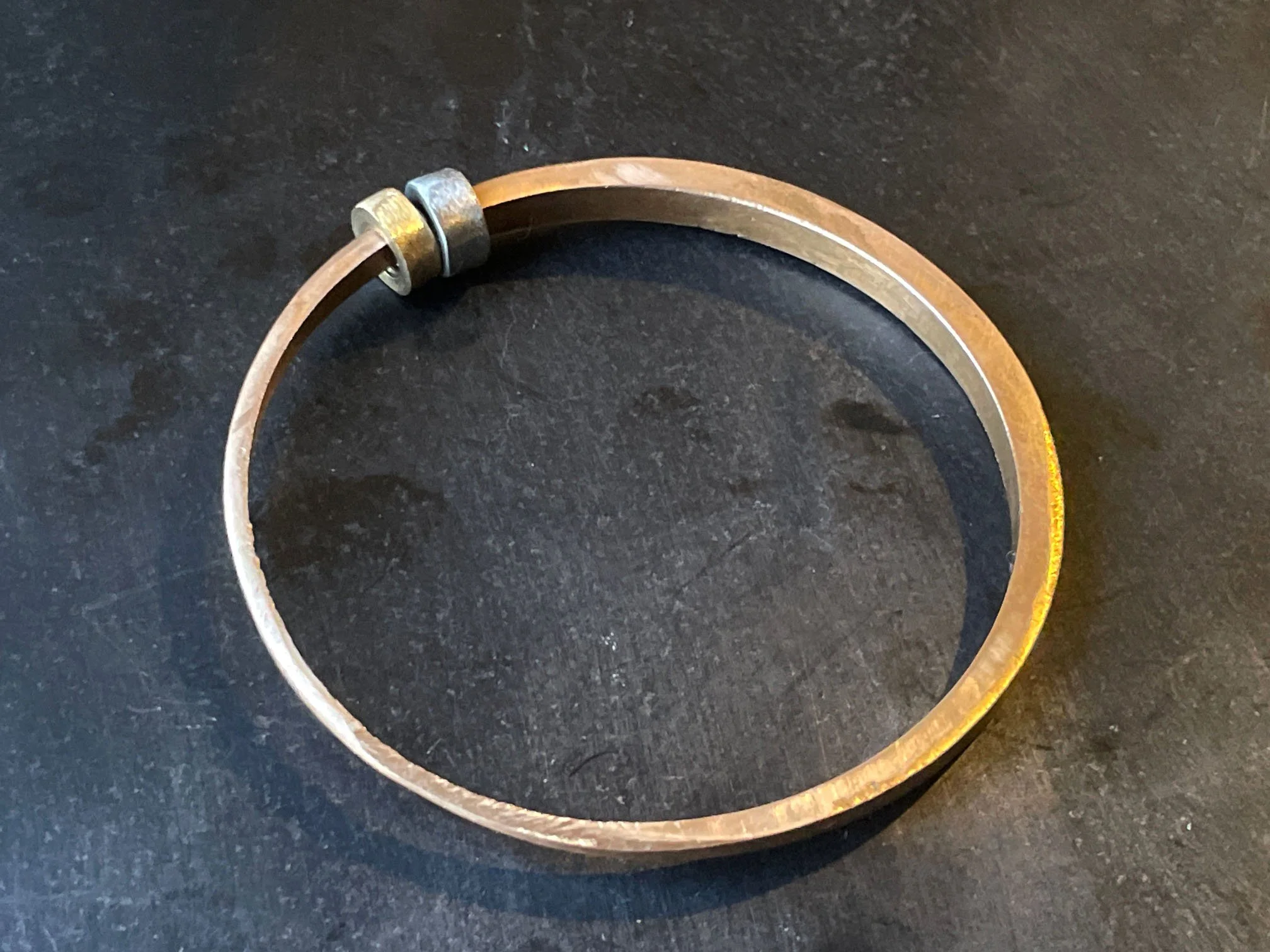 Cast metal jewellery piece